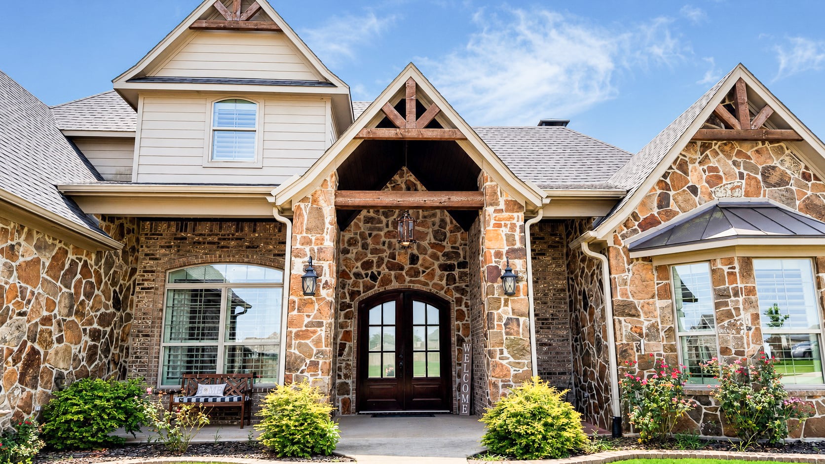Closer view of the stone and brick front exterior