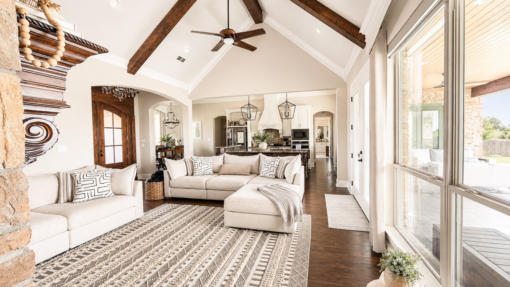 Living room with real wood floors and vaulted ceiling